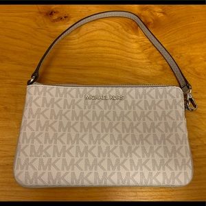 White Michael Kors wristlet